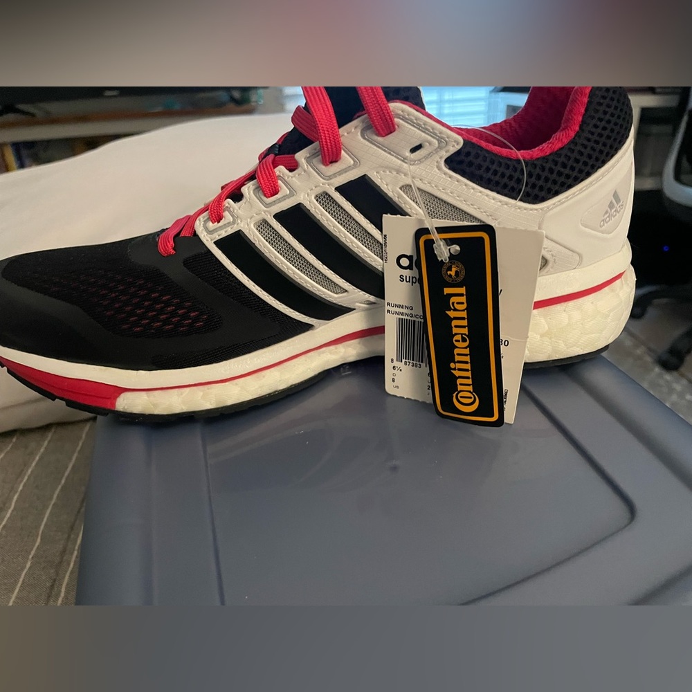 Never worn. Adidas super nova glide 6. Black, white and pink.